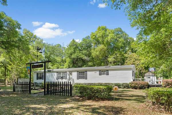 6.84 Acres of Land with Home for Sale in High Springs, Florida