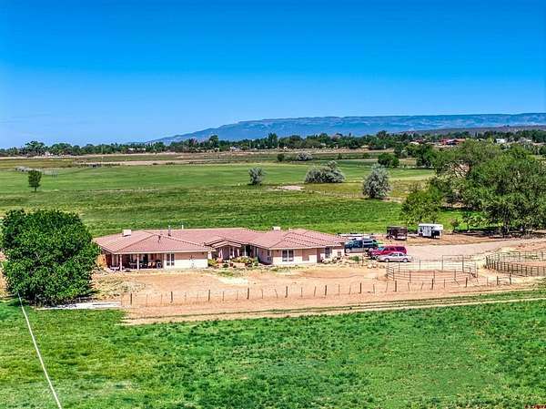 30.2 Acres of Agricultural Land with Home for Sale in Hotchkiss, Colorado
