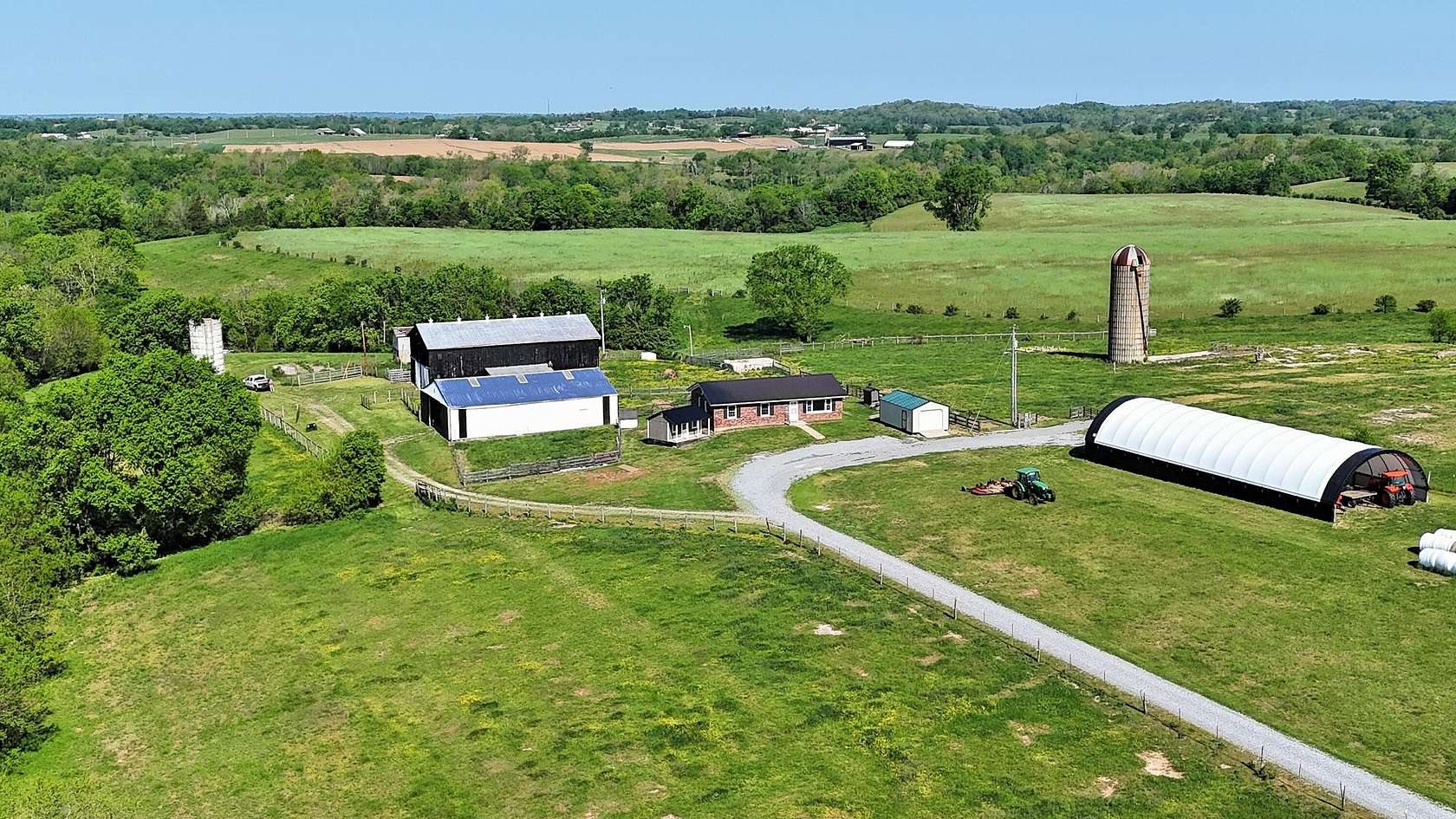 195 Acres of Land with Home for Sale in Salvisa, Kentucky