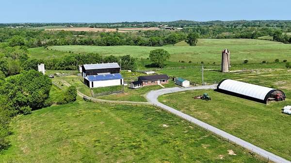 195 Acres of Land with Home for Sale in Salvisa, Kentucky