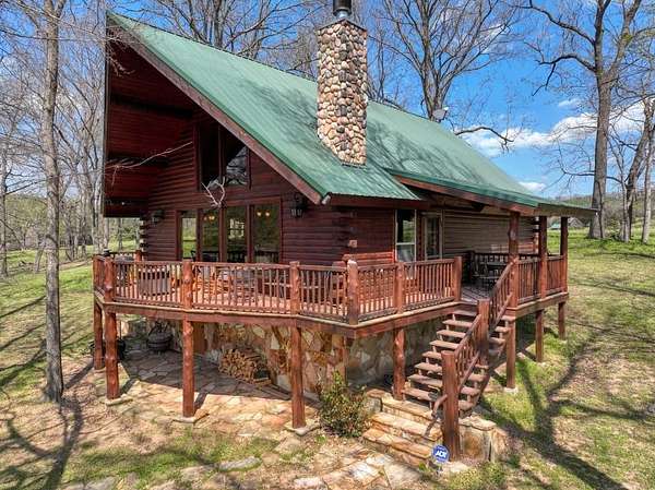 1.84 Acres of Land with Home for Sale in Berryville, Arkansas