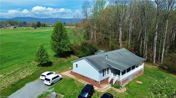 2.39 Acres of Land with Home for Sale in Thurmond, North Carolina