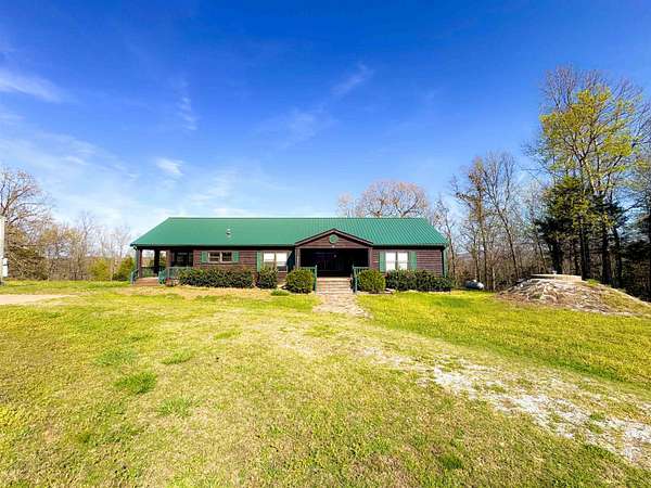 4 Acres of Land with Home for Sale in Mountain View, Arkansas