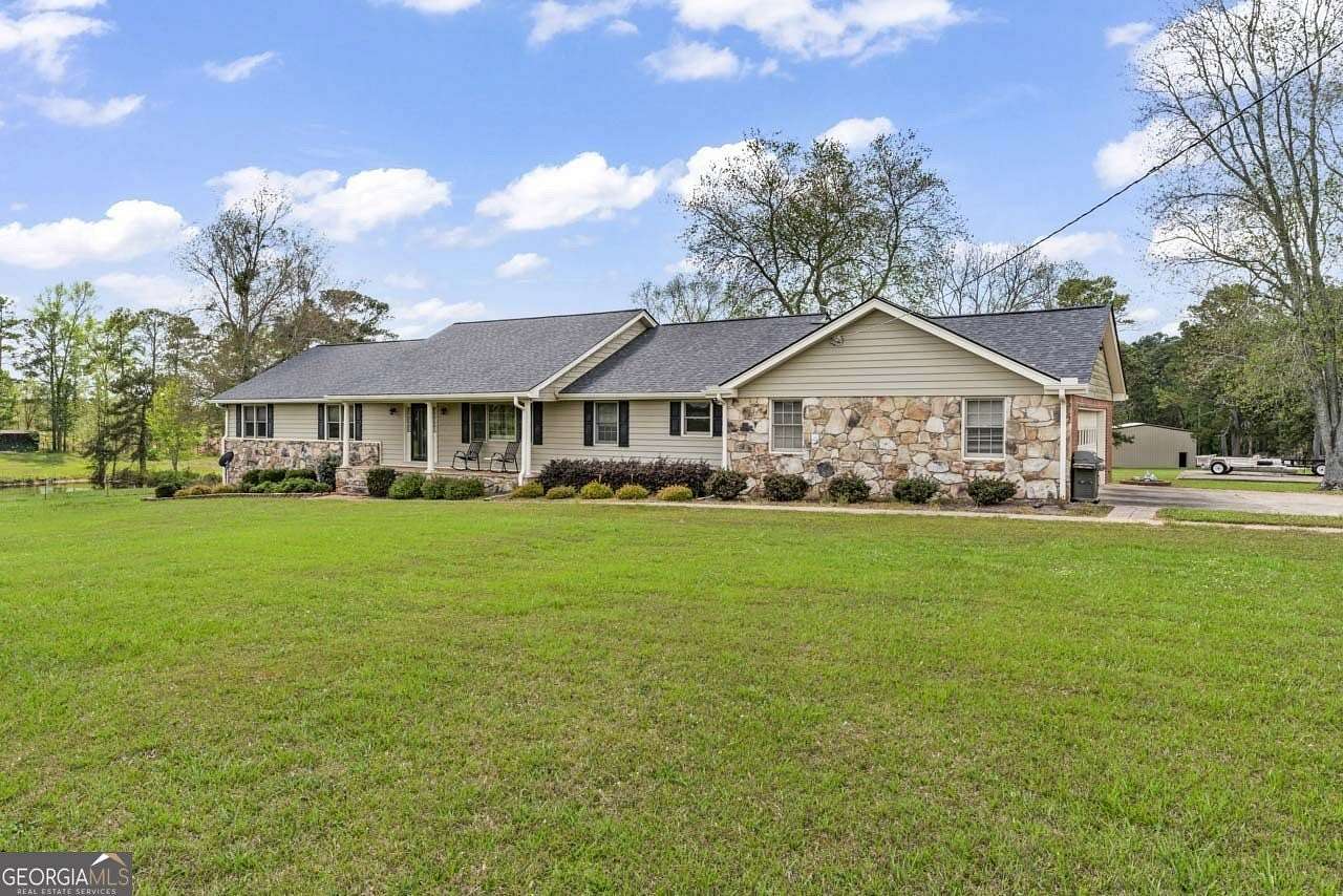 39.3 Acres of Land with Home for Sale in Hampton, Georgia