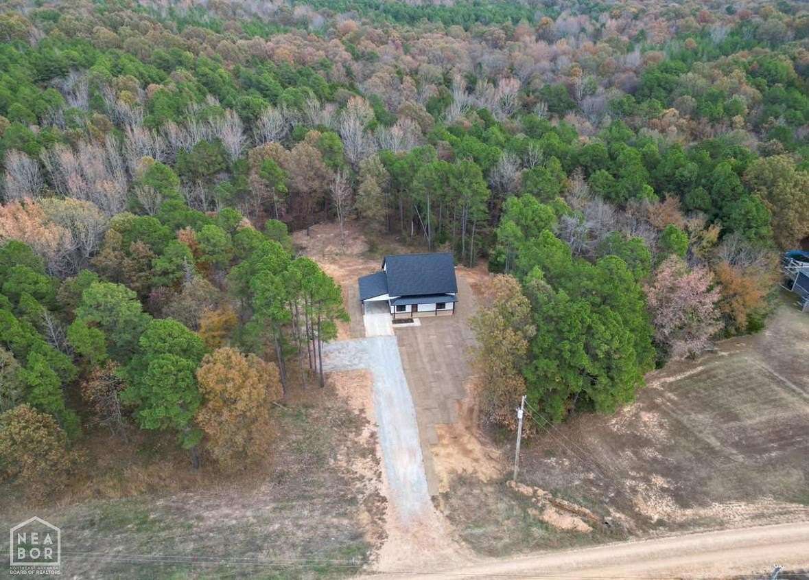 4.85 Acres of Land with Home for Sale in Paragould, Arkansas