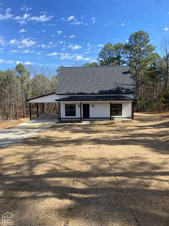 4.85 Acres of Land with Home for Sale in Paragould, Arkansas