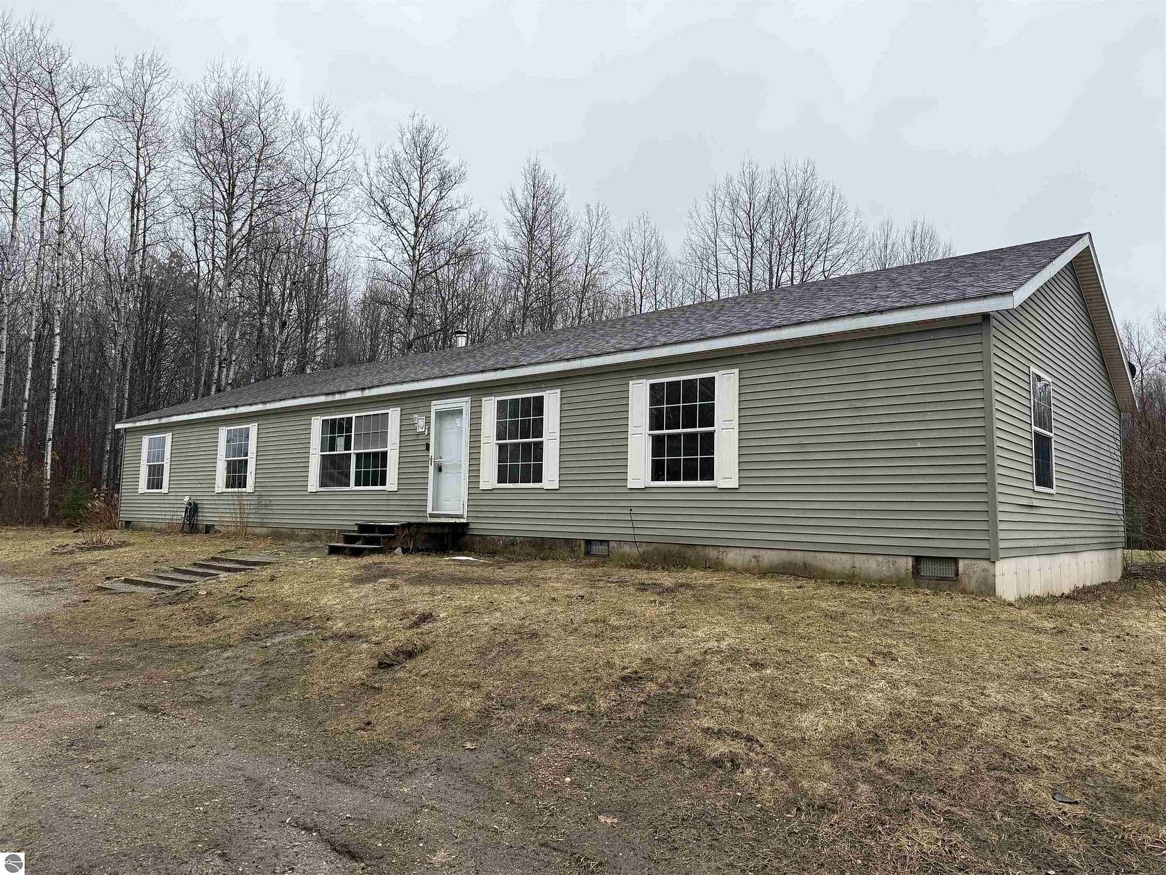 2 Acres of Land with Home for Sale in Manton, Michigan