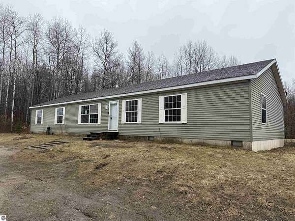 2 Acres of Land with Home for Sale in Manton, Michigan