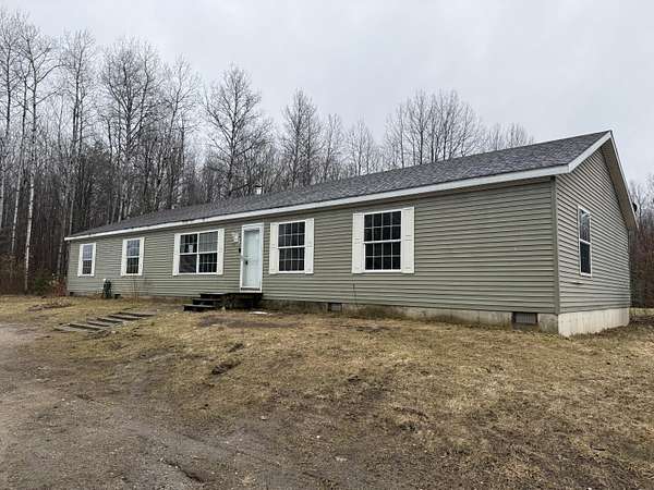 2 Acres of Land with Home for Sale in Manton, Michigan