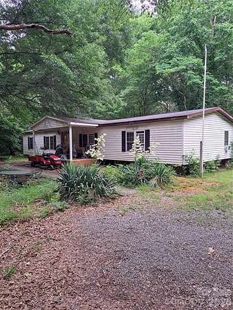 12.9 Acres of Land with Home for Sale in Stanley, North Carolina