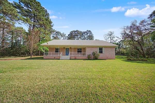 2.26 Acres of Land with Home for Sale in Timpson, Texas