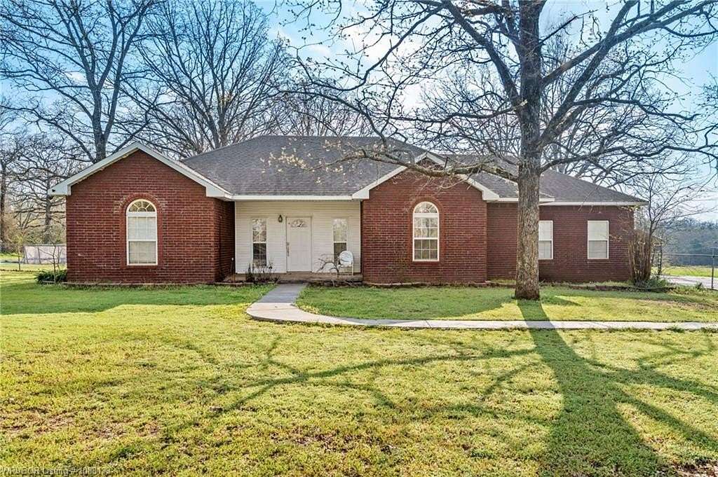 7 Acres of Land with Home for Auction in Muldrow, Oklahoma