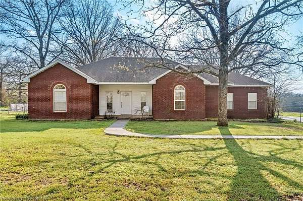 7 Acres of Land with Home for Sale in Muldrow, Oklahoma