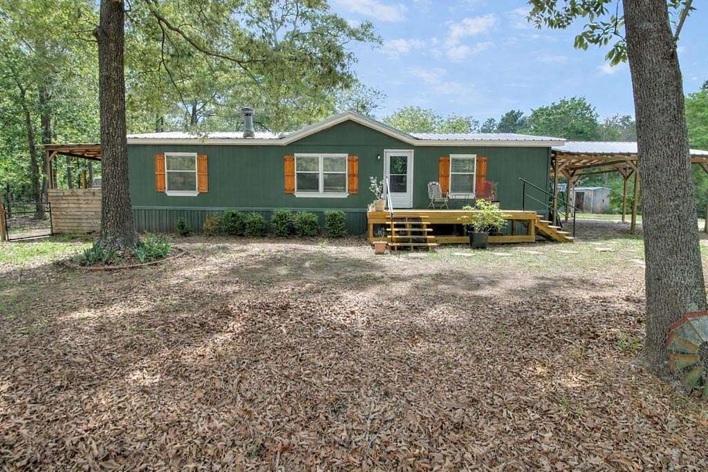 5 Acres of Land with Home for Sale in Lufkin, Texas