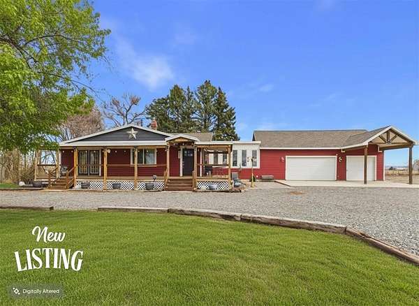 11.6 Acres of Land with Home for Sale in Powell, Wyoming