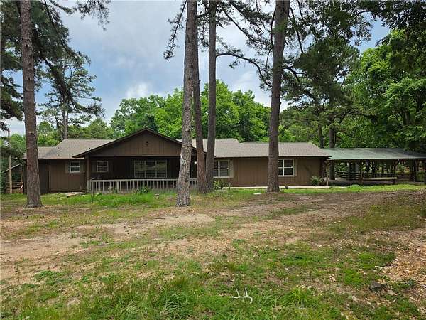 7.74 Acres of Land with Home for Sale in Rogers, Arkansas