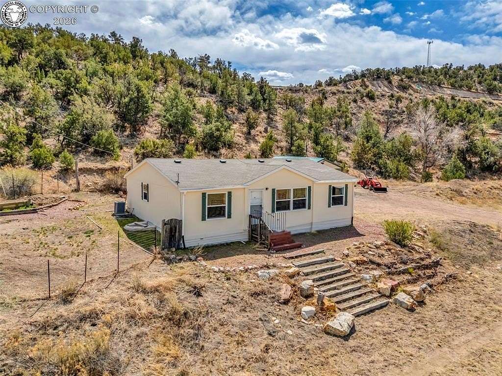 35.1 Acres of Agricultural Land with Home for Sale in Cañon City, Colorado