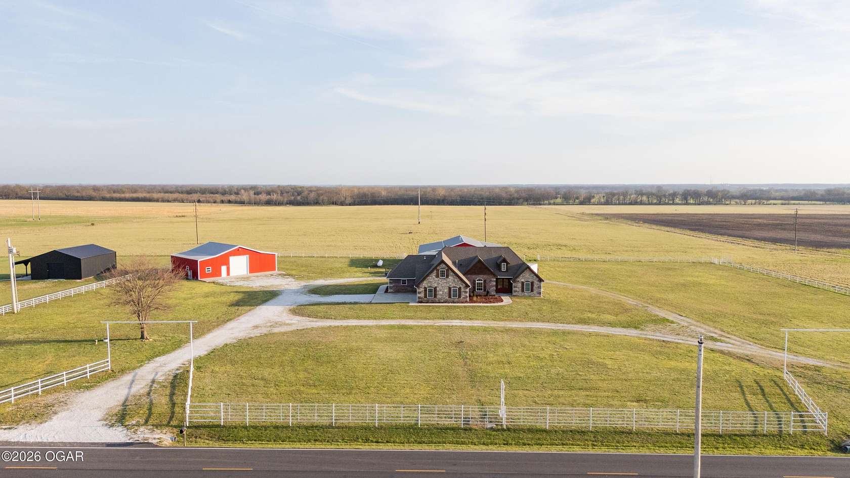 130 Acres of Land with Home for Sale in Carthage, Missouri