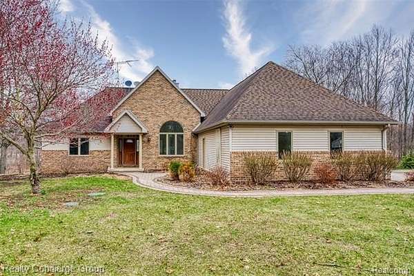 10 Acres of Recreational Land with Home for Sale in Conway Township, Michigan