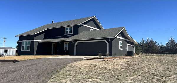 5 Acres of Land with Home for Sale in Fort Morgan, Colorado