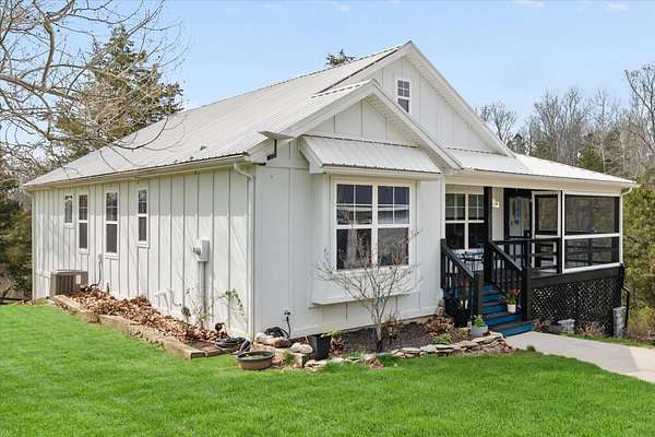 5.2 Acres of Land with Home for Sale in Pleasureville, Kentucky