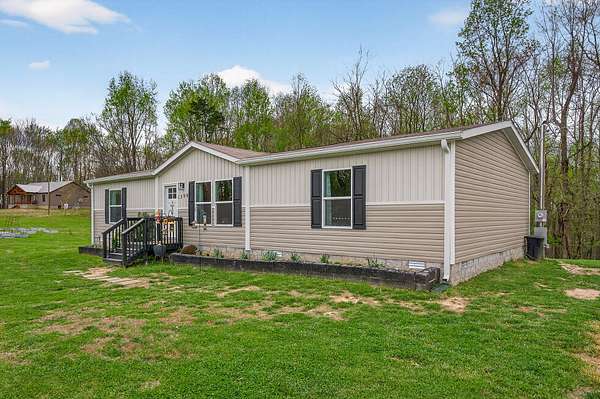 5.57 Acres of Land with Home for Sale in Liberty, Tennessee