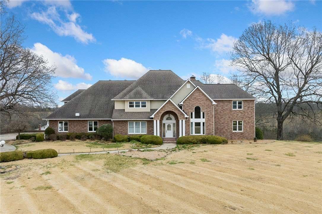 27 Acres of Land with Home for Sale in Harrison, Arkansas