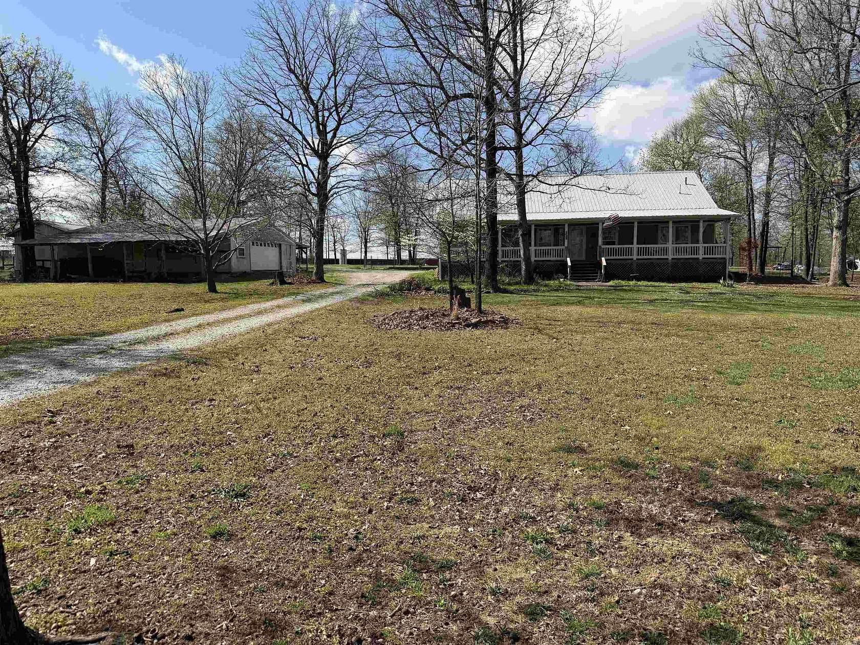 9.26 Acres of Land with Home for Sale in Locust Grove, Arkansas