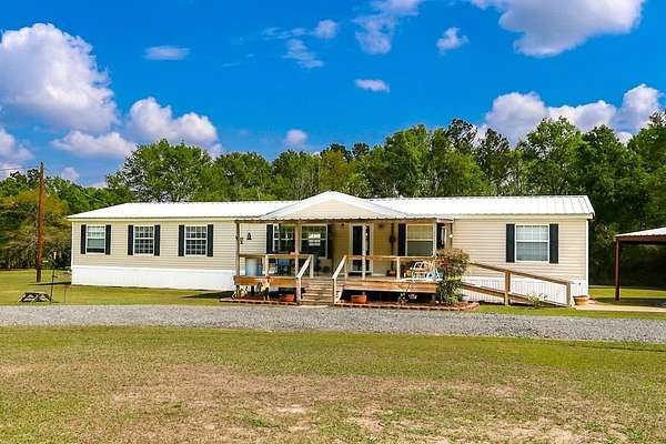 2 Acres of Land with Home for Sale in Apple Springs, Texas