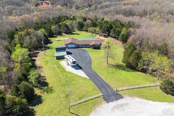 3.54 Acres of Land with Home for Sale in Reeds Spring, Missouri