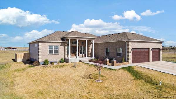 5 Acres of Land with Home for Sale in Cheyenne, Wyoming