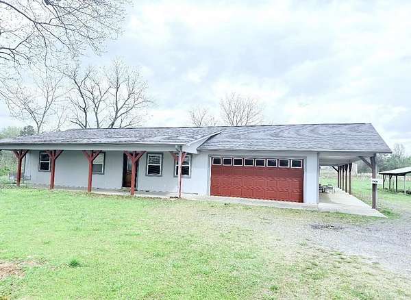 107 Acres of Recreational Land with Home for Auction in Clinton, Arkansas