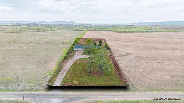 1.5 Acres of Land with Home for Sale in Tuscola, Texas