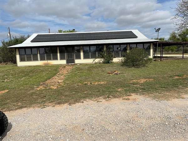 235 Acres of Land with Home for Sale in Mullin, Texas