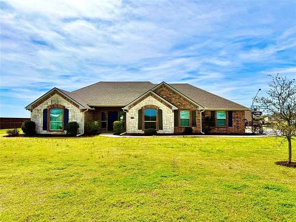 1.5 Acres of Land with Home for Sale in Caddo Mills, Texas