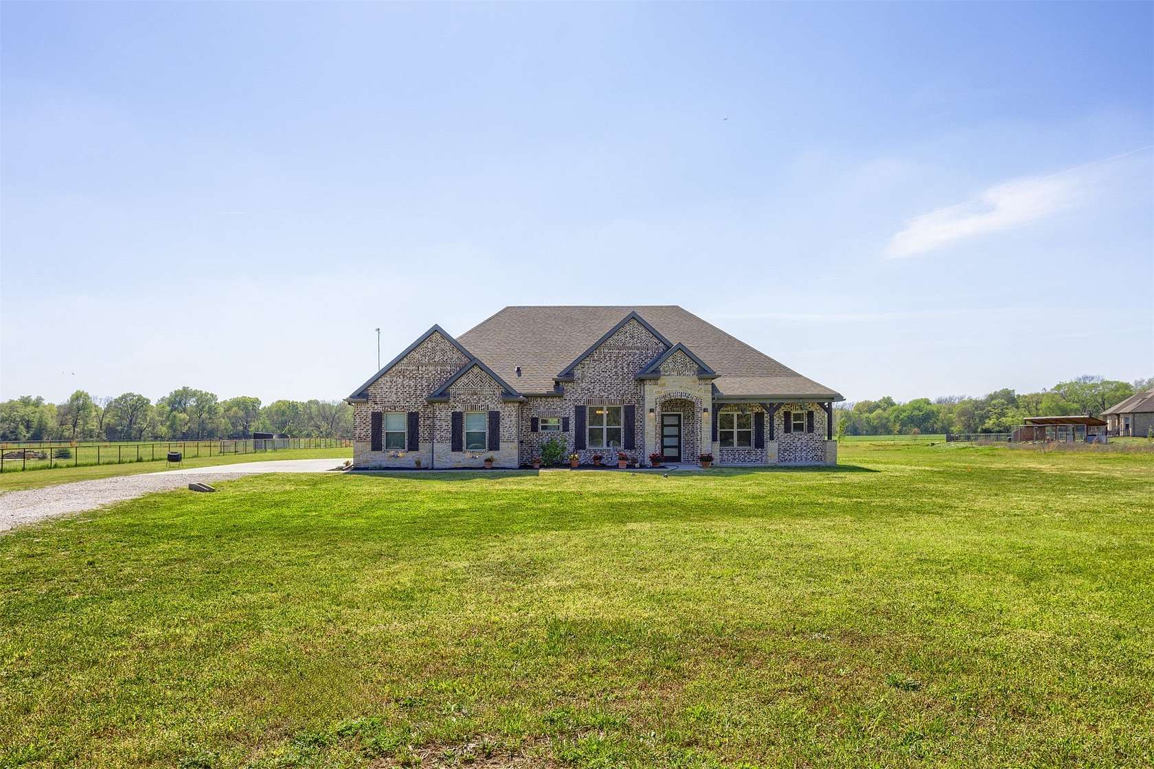 1.5 Acres of Land with Home for Sale in Farmersville, Texas