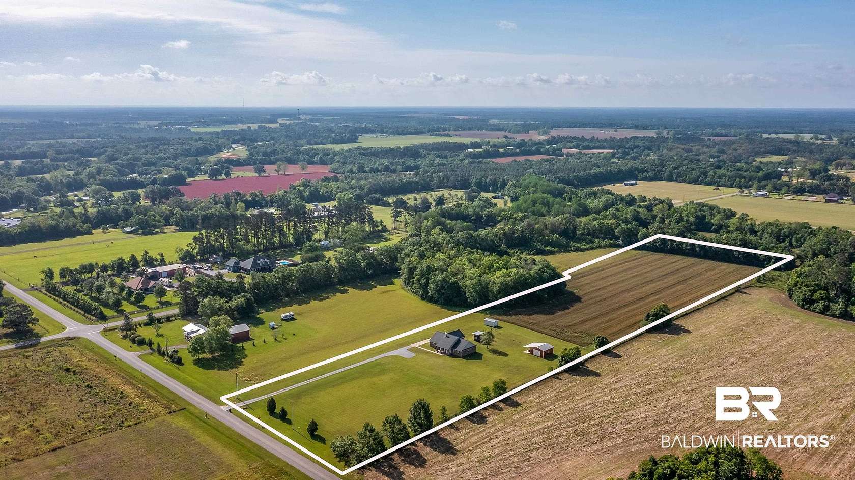 8.28 Acres of Land with Home for Sale in Robertsdale, Alabama