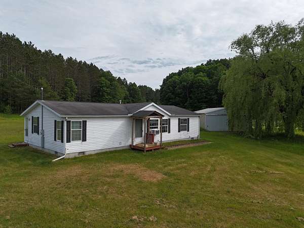 5 Acres of Land with Home for Sale in Kaleva, Michigan