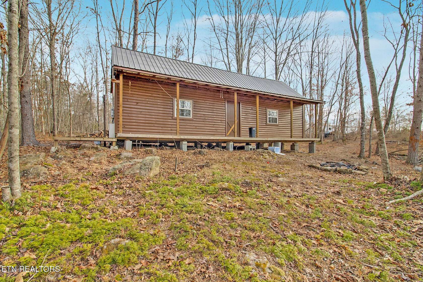 10 Acres of Improved Residential Land for Sale in Deer Lodge, Tennessee