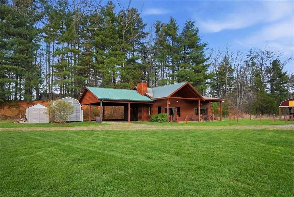 1.5 Acres of Land with Home for Sale in Morganton, Georgia
