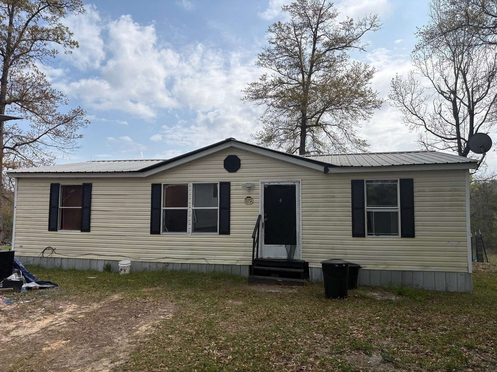 5 Acres of Land with Home for Sale in Coffeeville, Alabama