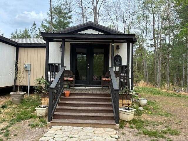 3.59 Acres of Land with Home for Sale in Ten Mile, Tennessee