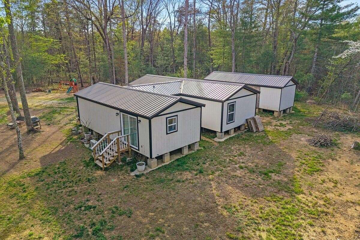 3.59 Acres of Land with Home for Sale in Ten Mile, Tennessee