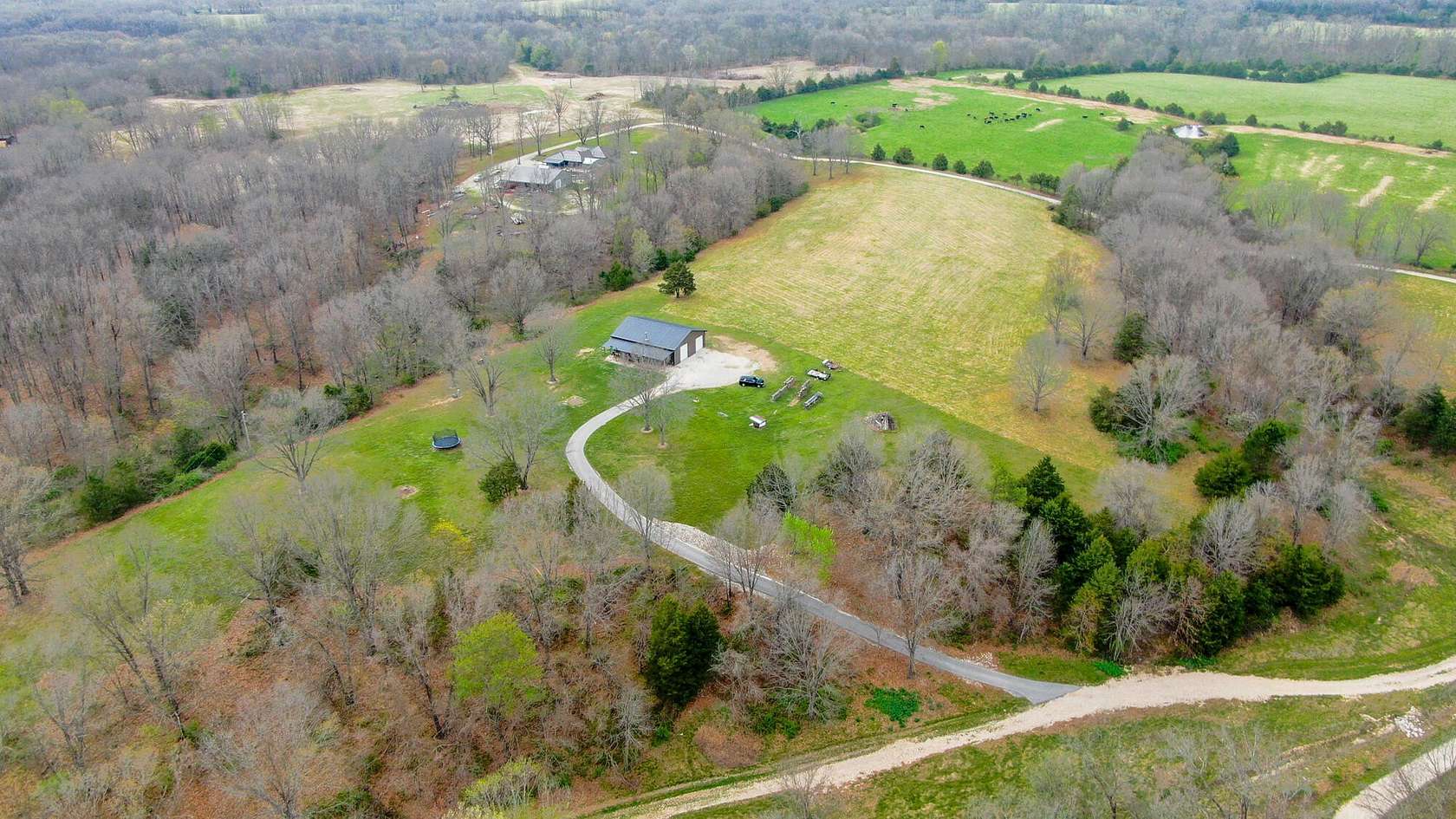 6.9 Acres of Land with Home for Sale in Rogersville, Missouri