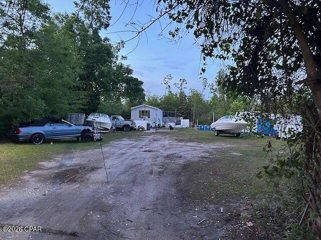 4.65 Acres of Land with Home for Sale in Panama City, Florida