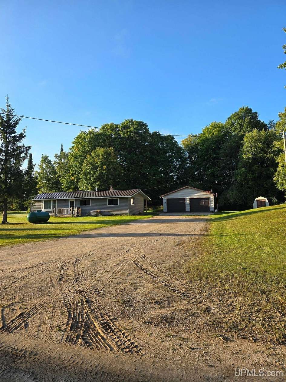 2.76 Acres of Land with Home for Sale in Chatham, Michigan