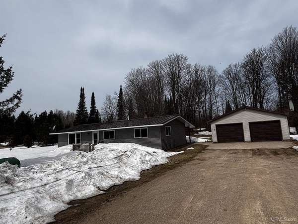 2.76 Acres of Land with Home for Sale in Chatham, Michigan