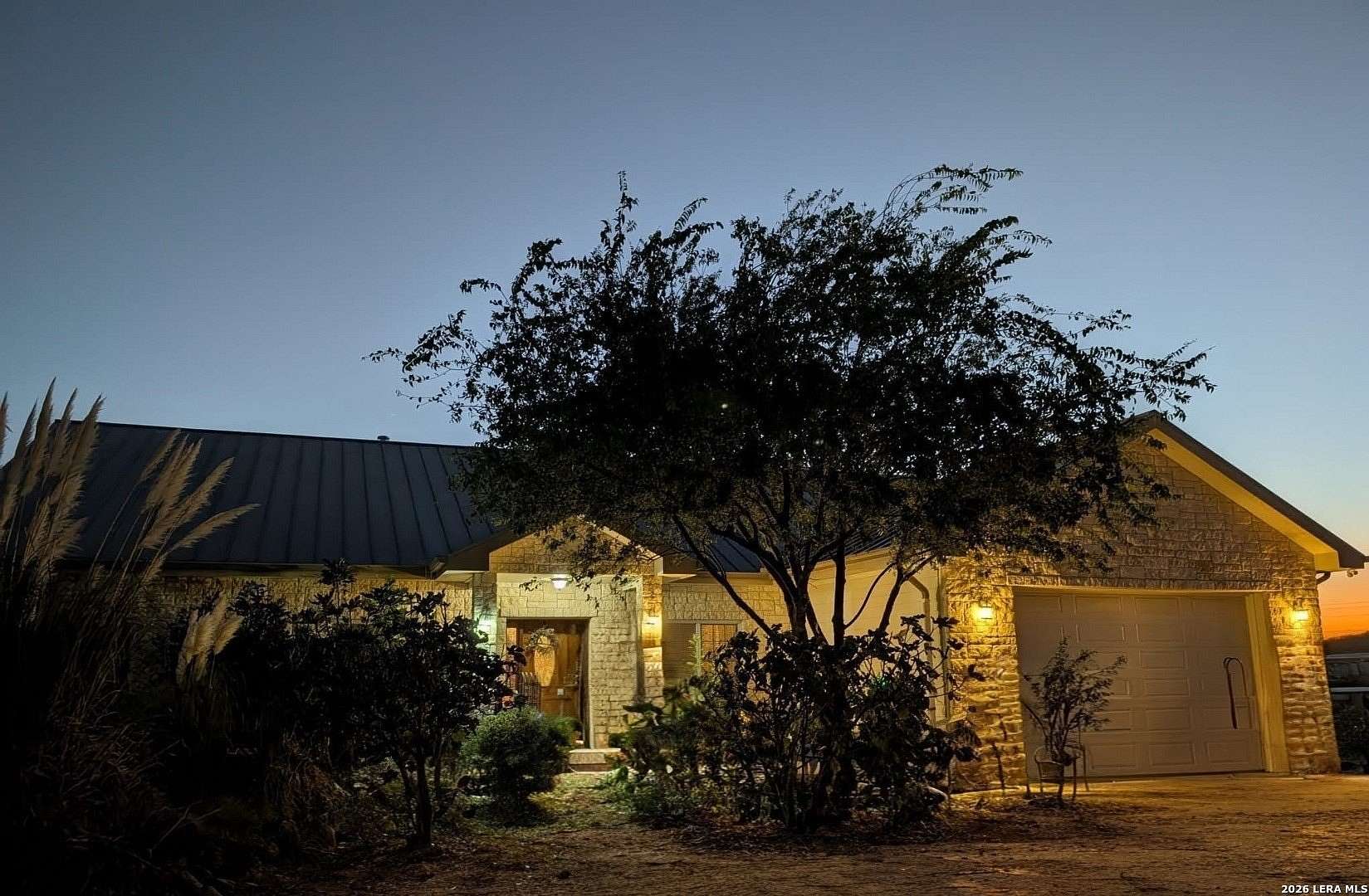 25.3 Acres of Agricultural Land with Home for Sale in Medina, Texas