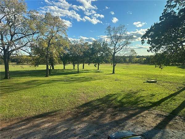 5 Acres of Residential Land for Sale in Gravette, Arkansas