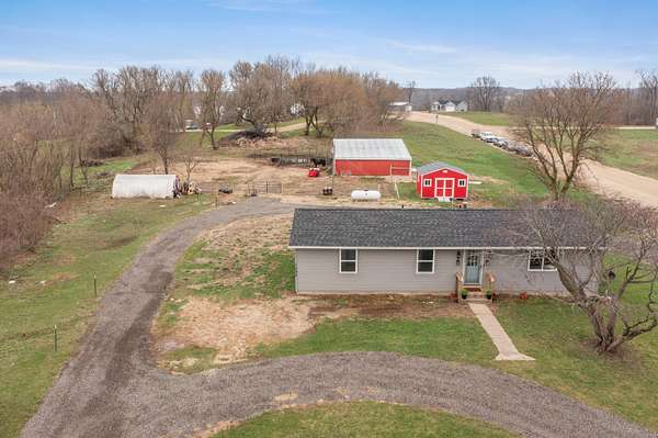 5.87 Acres of Land with Home for Sale in Hopkins, Michigan